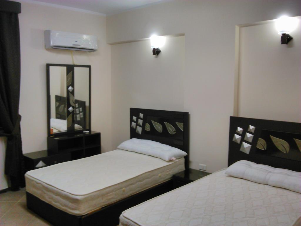 Three-Bedroom Apartment At Louly Beach Resort 艾因苏赫纳 客房 照片
